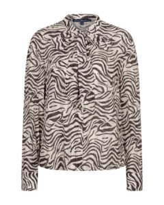 Blouse zébrée pour un pantalon simili cuir le soir